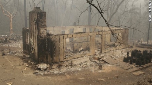 California wildfires kill one person, destroy more homes